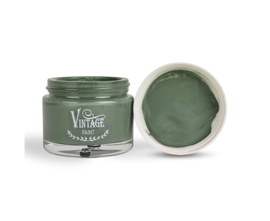 Vintage Paint Kreidefarbe - Dusty Olive
 
Vintage Paint "Dusty Olive" ist eine natürliche, umweltfreundliche Farbe auf Wasserbasis die speziell entwickelt wurde um Deinem Kunstwerk die authentisch matte und kreidige Oberfläche zu verleihen, für die zb. alte oder antike Möbel bekannt sind. Die Farbe haftet ohne besondere Vorbereitung auf fast jeder Oberfläche (Ton, Metall, Glas, Keramik, Holz, Kunststoff, Stoff, Textilien etc.) und bietet eine gute Deckkraft. Sie passt perfekt und harmoniert mit dem Französisch Nordic Landhausstil.

Du kannst sie auf Möbeln, Gebrauchsgegenständen, Wänden, Böden, Fliesen etc. verwenden, um Deinen Lieblingsstil oder auch verschiedene dekorative Effekte zu kreieren. Die Kreidefarbe ist beinahe geruchlos und trocknet sehr schnell. Das spezielle Bindemittel macht den Lack flexibel, sehr lange haltbar und eignet sich daher auch gut für Fussböden und Treppen. Das Schleifen ist normalerweise nicht erforderlich, solange die Oberfläche sauber ist und sich die älteren Farbschichten nicht ablösen. Sie können deckend oder auch mit wasser verdünnt verarbeitet werden, so kannst Du lasierende, schimmernde Vintage Effekte erzielen.

Natural Vintage Paint lässt sich äusserst komfortabel verarbeiten und kann drinnen und auch draussen verwendet werden. Vintage Paint Kreidefarben sind nach dem durchtrocknen Wasserbeständig. Wir empfehlen zum Schutz und zur besseren Reinigung dennoch die Flächen durch Antique Wax, den Primer & Sealer oder bei besonders beanspruchten Flächen wie Fussböden den Ultra Matt Vanish als Versiegelung zu verwenden.